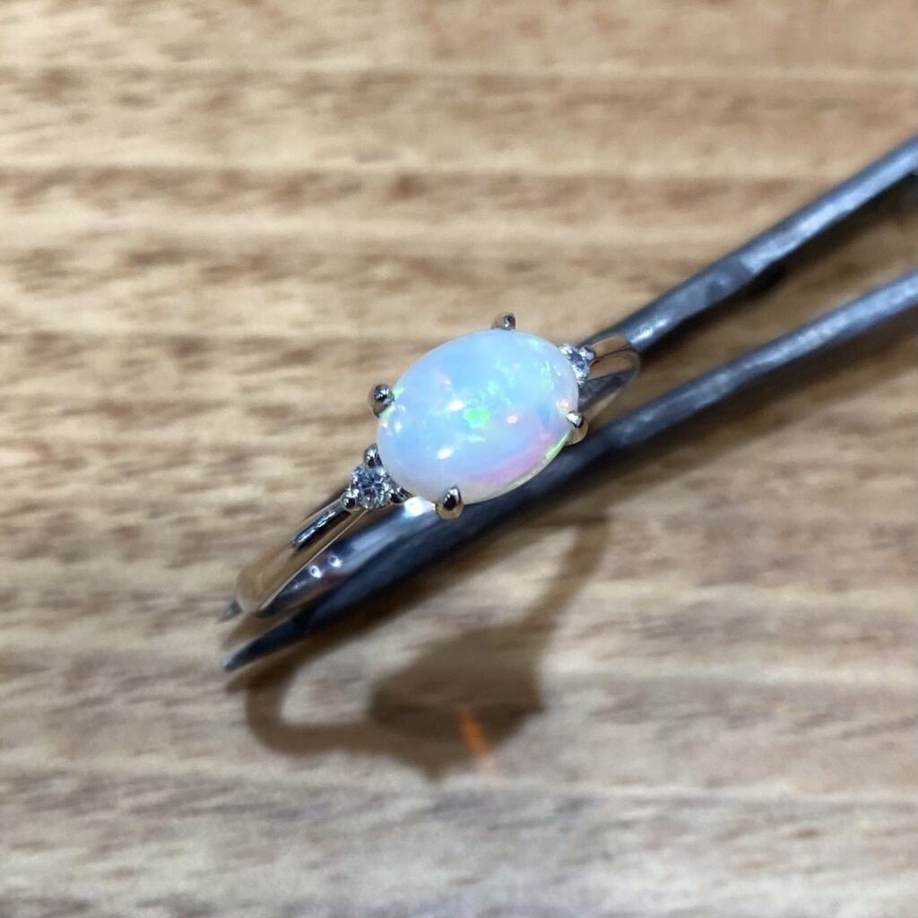 Solid Opal Ring Set In 9k White Gold