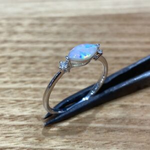 Solid Opal Ring Set In 9k White Gold