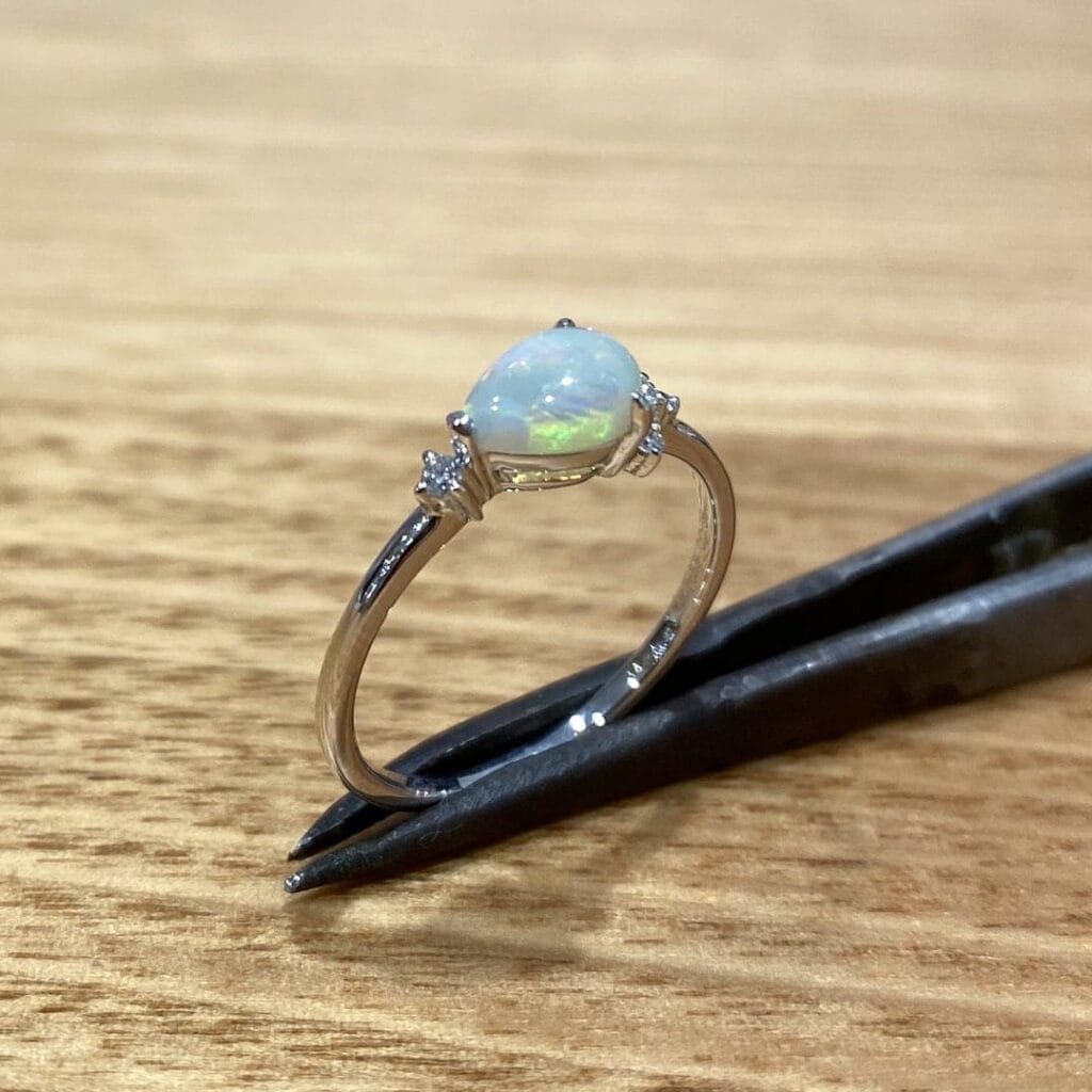 Solid Opal Ring Set In 9k White Gold